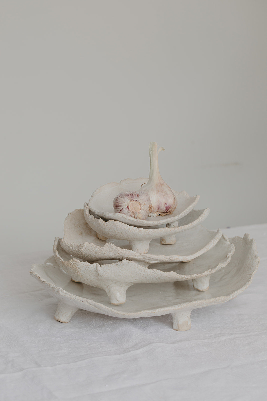 Tripod Stone Serving Dishes